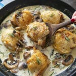 Rosemary Mushrooms and creamy sauce over a chicken thigh