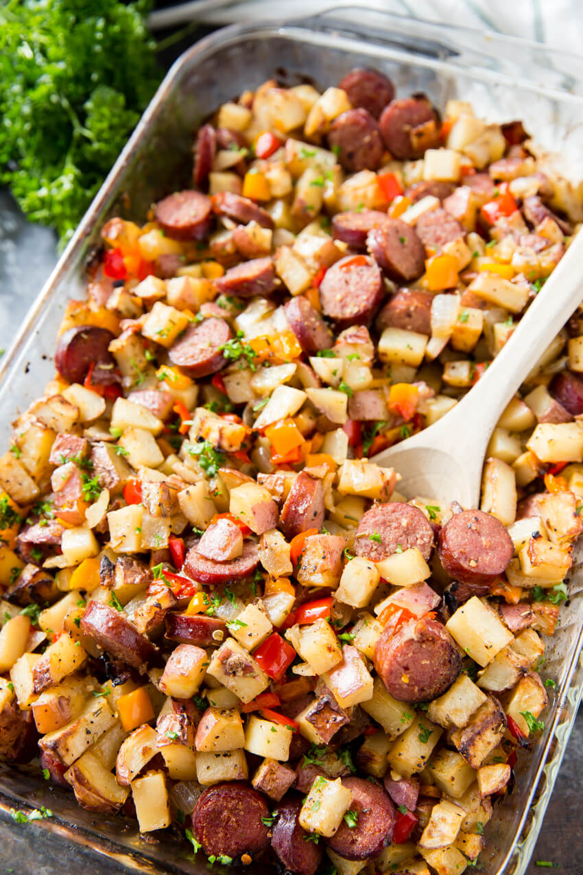 Baked Sausage, Potatoes, and Peppers: A hearty and filling side dish, full meal, breakfast hash, with plenty of flavor. This Potato, Pepper, and Sausage Bake is perfect for grilling season too! 