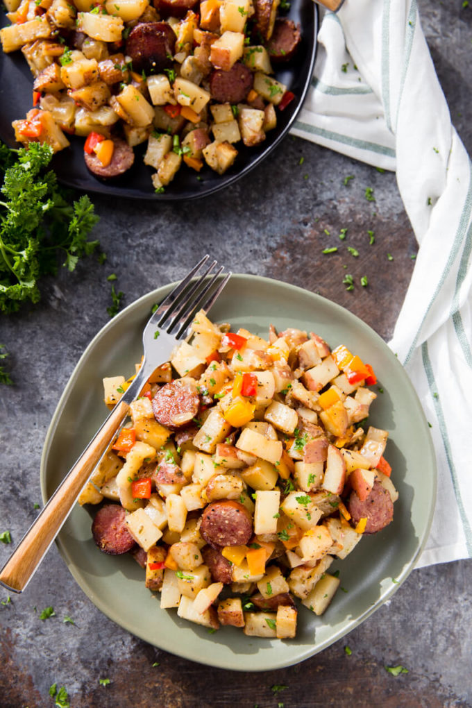 Sausage Potato Pepper Bake: A hearty and filling side dish, full meal, breakfast hash, with plenty of flavor. This Potato, Pepper, and Sausage Bake is perfect for grilling season too! 