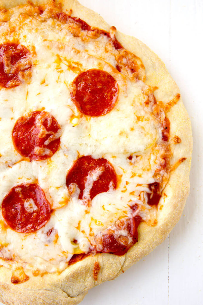 Cheese and pepperoni pizza with white background.