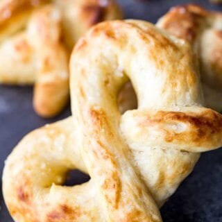 Easy buttery soft pretzels are crispy outside, pillowy inside, and so delicious
