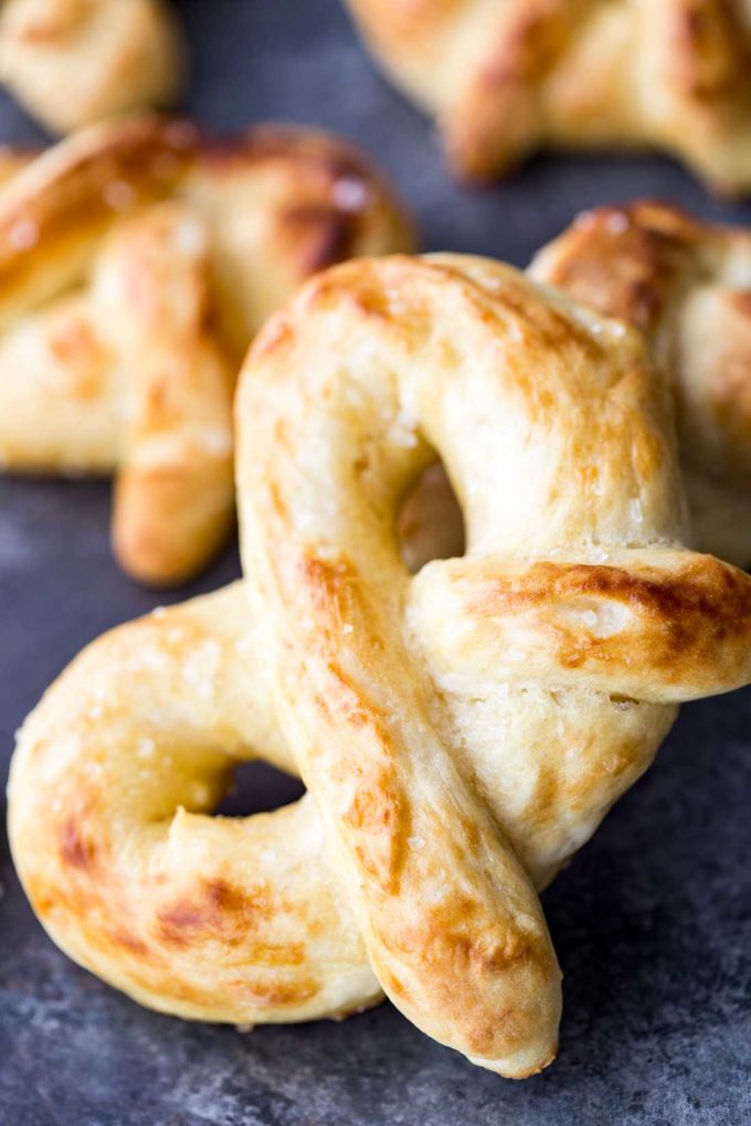 Easy buttery soft pretzels are crispy outside, pillowy inside, and so delicious