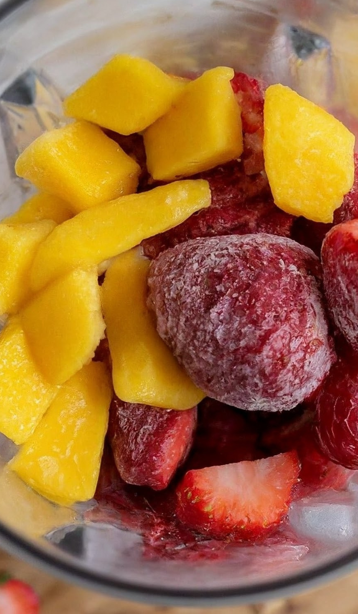 What you need to make a strawberry orange mango smoothie