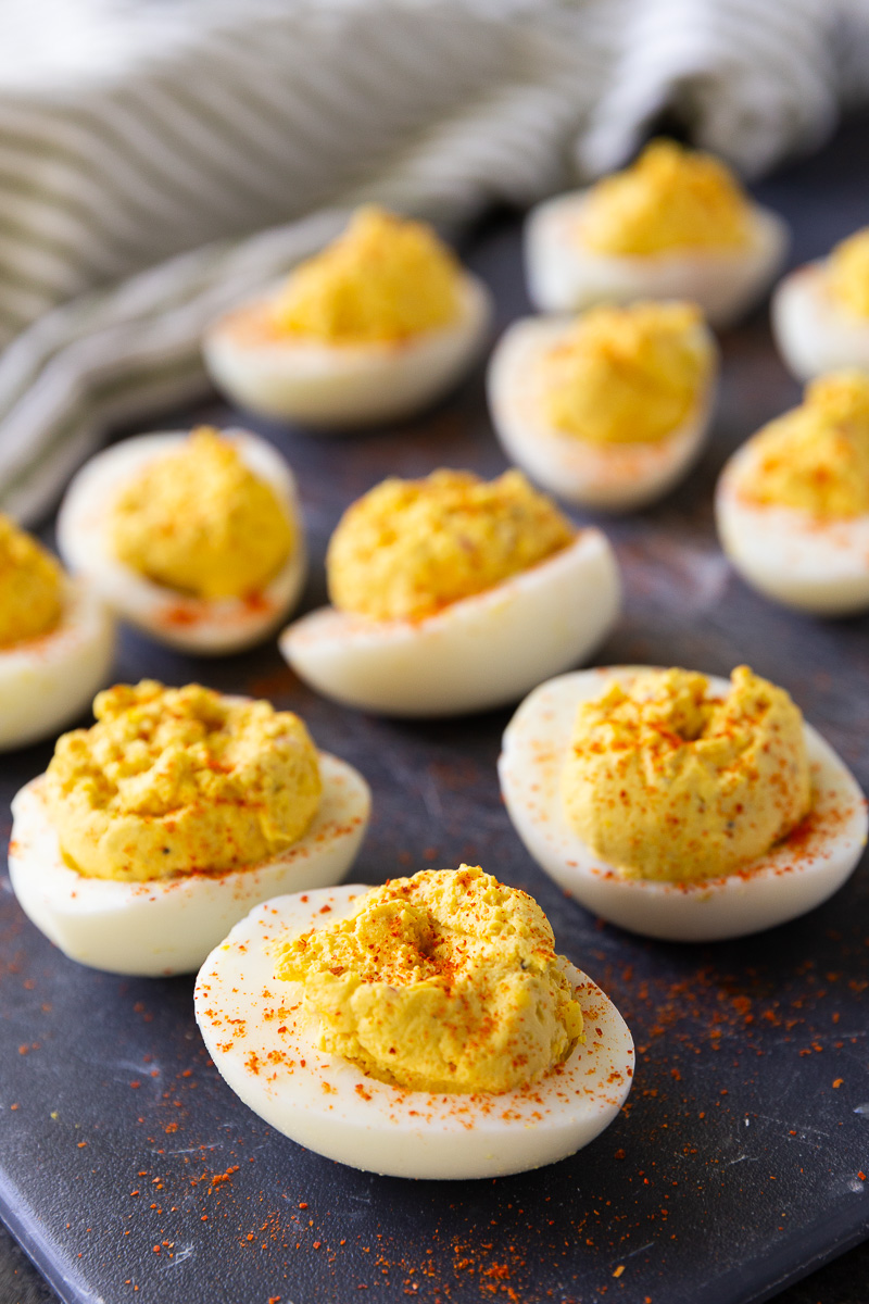 Smooth and creamy deviled eggs topped with paprika, neatly displayed and ready to serve—an easy, crowd-pleasing appetizer perfect for any occasion.