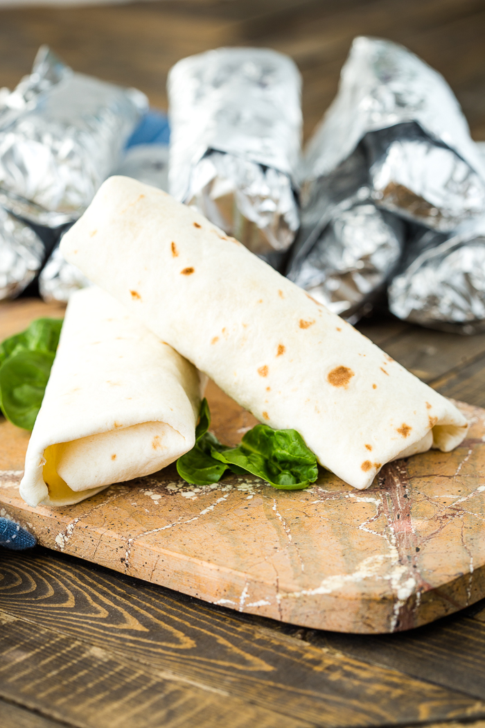 Tortillas, foil wrapped breakfast burritos