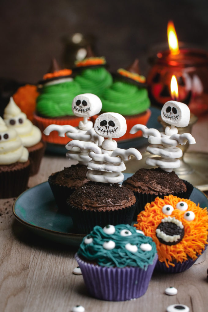 Halloween themed cupcakes. Skeleton cupcakes, monster cupcakes, ghost cupcakes, and witch cupcakes. 