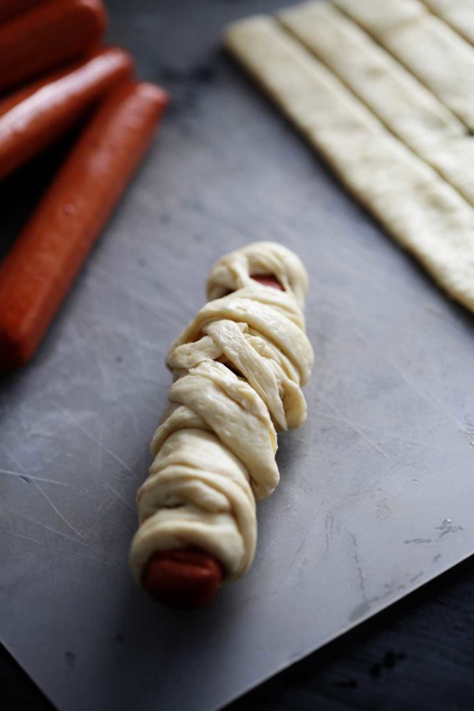 Mummy Dogs for Halloween are a perfect meal that are lots of fun for the kids! Mummy Dogs are a fun, festive, and easy meal.