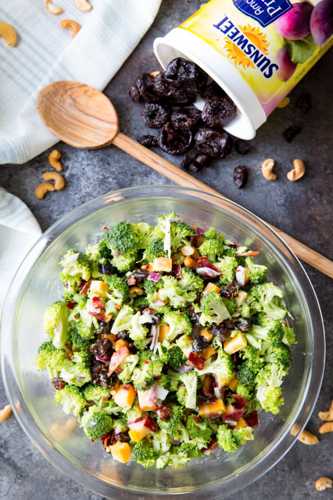 Best Ever Broccoli Salad: Broccoli, cashews, cheese, bacon, red onion, dried fruit and a tangy sauce