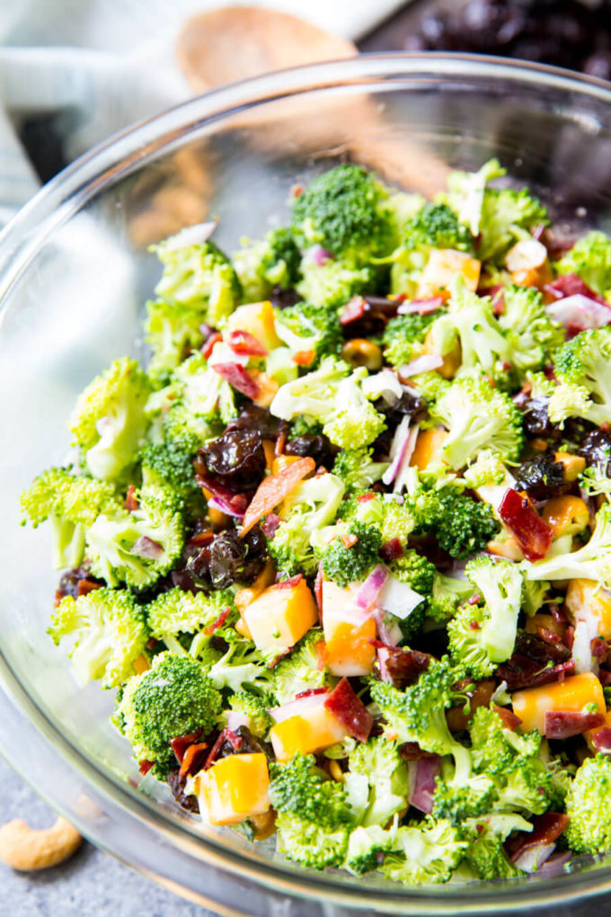 Best Ever Broccoli Salad: Broccoli, cashews, cheese, bacon, red onion, dried fruit and a tangy sauce