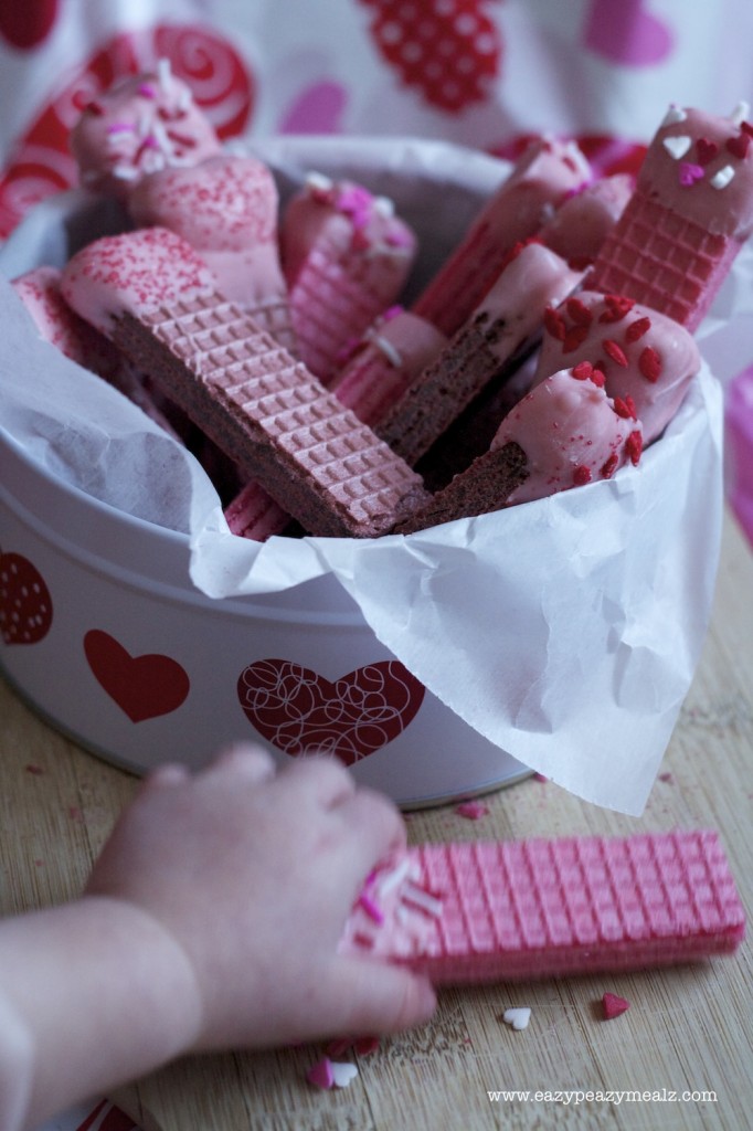 Baby grabbing valentine wafers