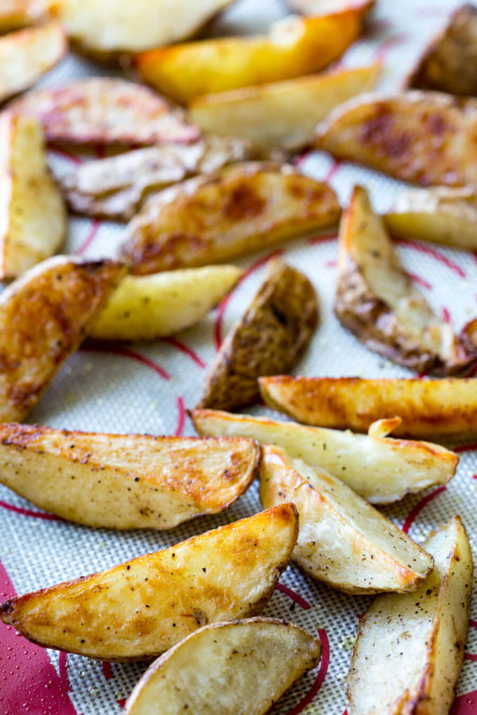 Homemade Steak Fries: Crispy, crave-worthy, delicious steak fries that are baked, not fried. They have a nice crispy outer layer and the inside is melt in your mouth soft and delicious. This method is super easy, and produces great fries every time!