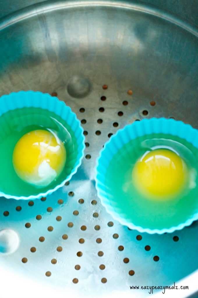 how to steam eggs, eggs in the silicone cups ready to be steamed. 