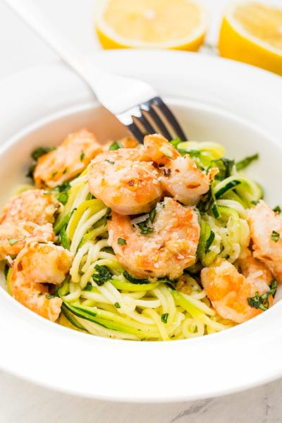 A plate full of zucchini noodle shrimp scampi