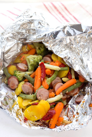 Campfire Dinners: Sausage, veggie, and a whole lotta flavor, cooked in foil in the coals of a fire.