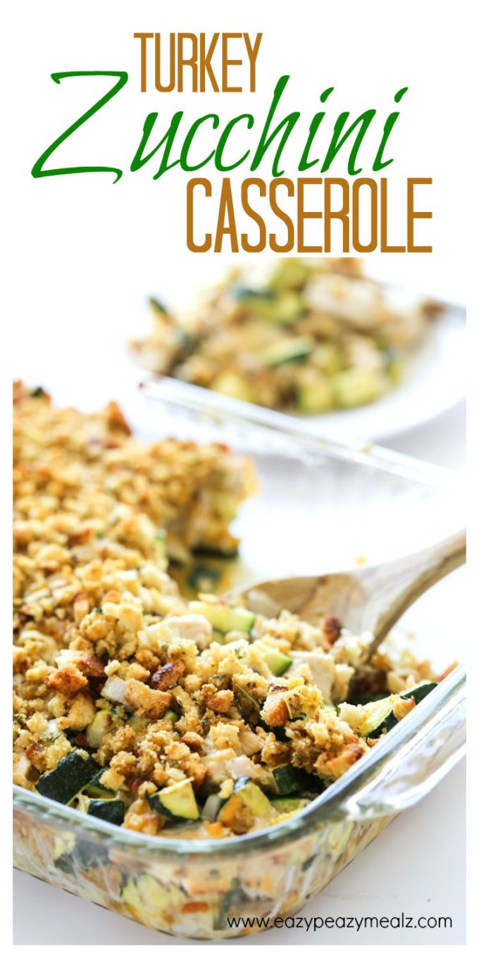 Cheesy Turkey Zucchini Casserole: Fresh baked casserole in a glass dish with a wooden spoon in it.