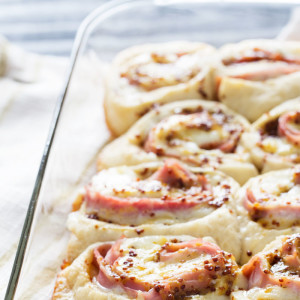 Ham and havarti roll up with a creamy honey mustard sauce.