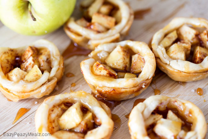 Salted Caramel Apple Pie Bites: Little buttery, flaky pie bites, filled with apple and spices, and drizzled in caramel and salt!