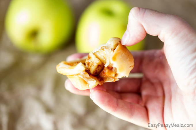 Muffin Tin Apple Pies: Little buttery, flaky pie bites, filled with apple and spices, and drizzled in caramel and salt!