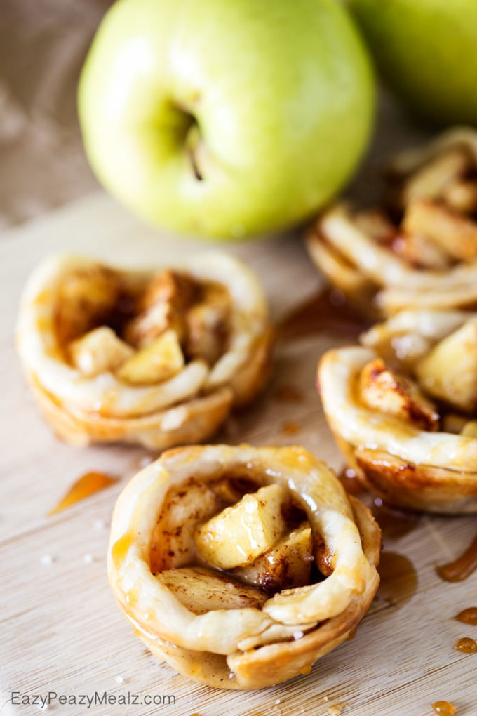 Caramel Apple Bites: Little buttery, flaky pie bites, filled with apple and spices, and drizzled in caramel and salt!