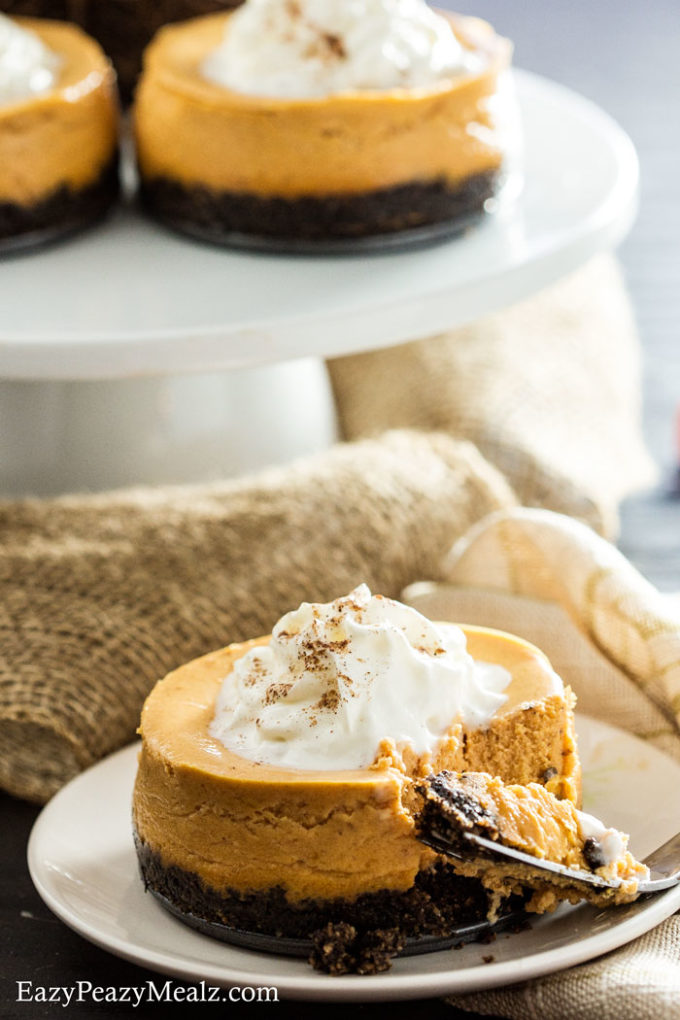 Pumpkin cookie cheesecake has a rich oreo, graham cracker, pecan, and brown sugar crust, and a light airy cheesecake! Delicious. 