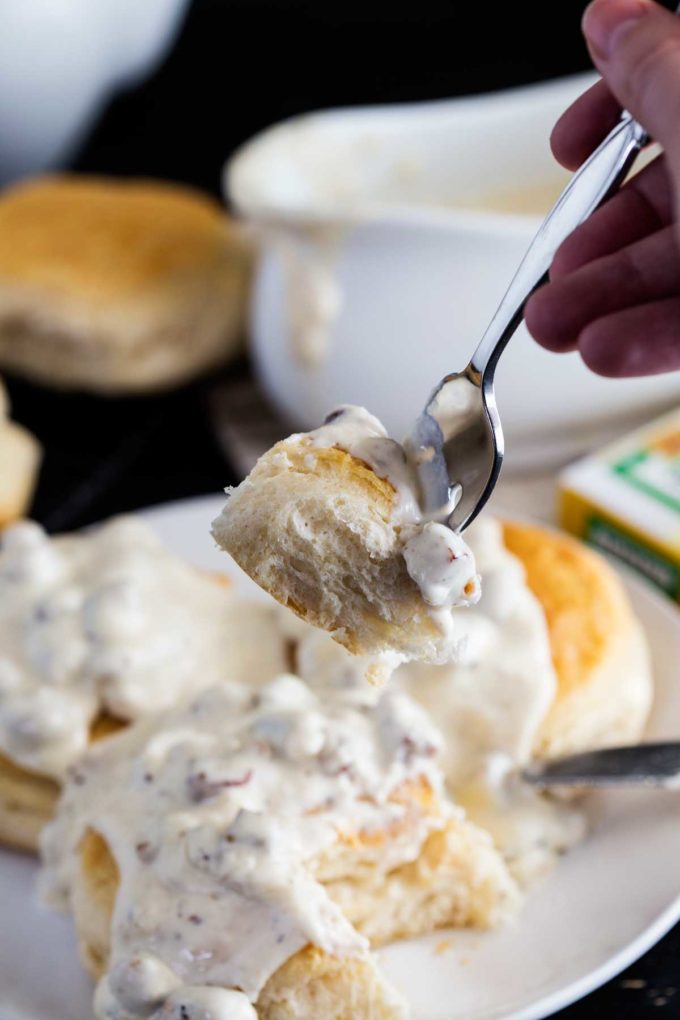 a simple classic breakfast, biscuits and chicken sausage gravy, a delicious breakfast of biscuits and gravy 