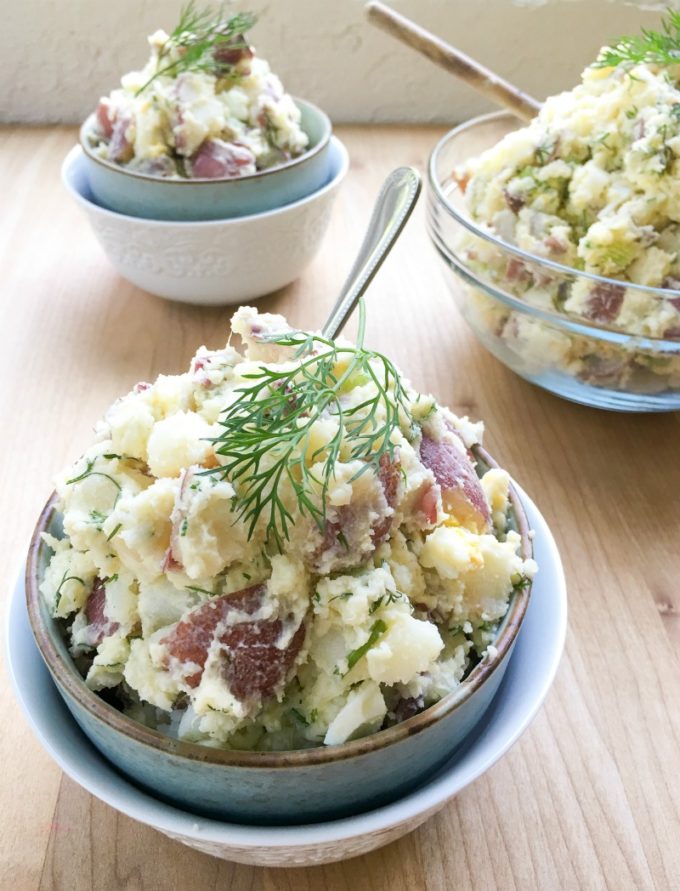 Red Bliss Potato Salad Recipe: Crisp celery, onion, Dijon mustard, eggs, and fresh dill gives it a satisfying crunch and flavor and enough to feed a hungry crowd.