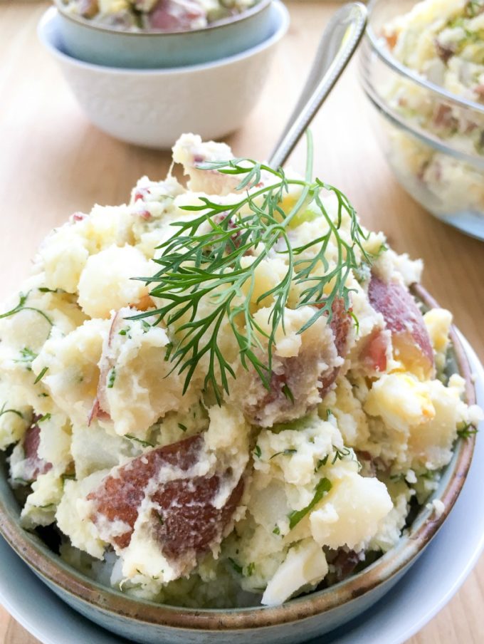Red Potato Salad Recipe: Crisp celery, onion, Dijon mustard, eggs, and fresh dill gives it a satisfying crunch and flavor and enough to feed a hungry crowd.
