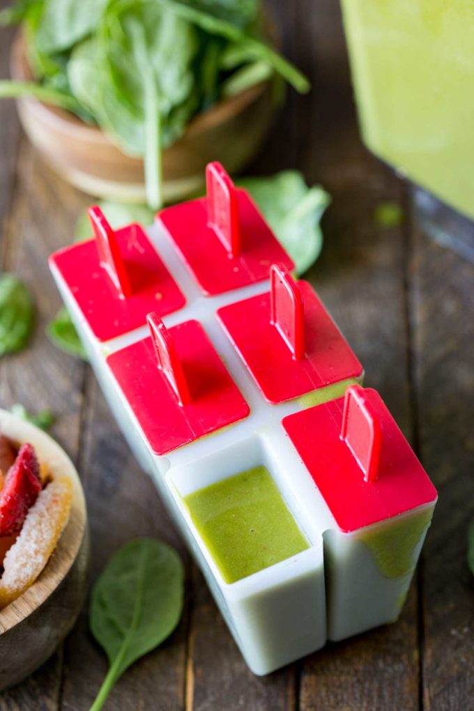 Green smoothie pops in mold