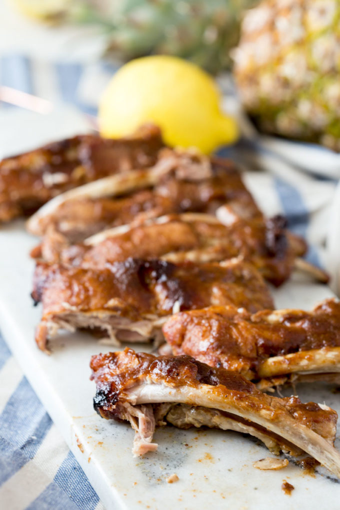 Fall off the bone tender island style pineapple BBQ pork ribs cooked in the slow cooker