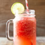 An insanely delicious recipe for a homemade healthy Watermelon Slush that surpasses all kids requirements: sweet, colorful, refreshing and fun! And all that with less than 5 minutes prep!