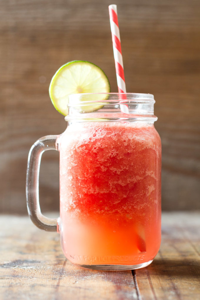 An insanely delicious recipe for a homemade healthy Watermelon Slush that surpasses all kids requirements: sweet, colorful, refreshing and fun! And all that with less than 5 minutes prep!