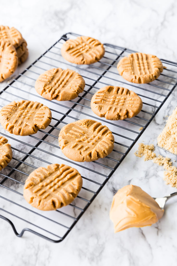 A cooling rack filled with the easiest 3 ingredient peanut butter cookies