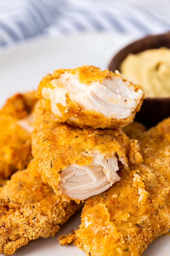 air fryer cutlets bitten into and stacked