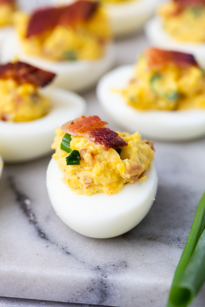 Bacon cheddar ranch deviled eggs are a low carb snack perfect for the keto diet. 