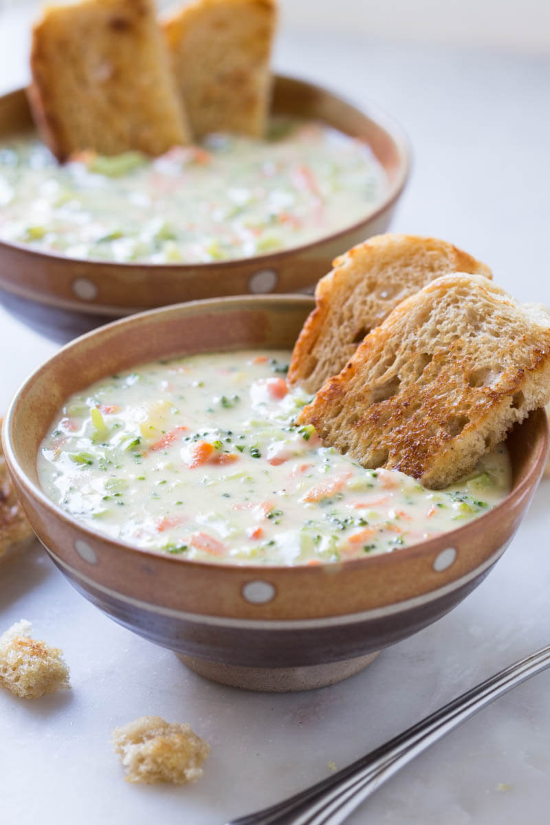 This deliciously creamy and cheesy broccoli soup is very easy to prepare at home. Prepared using fresh broccoli, carrot, and cheddar cheese.