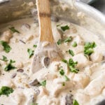 chicken stroganoff sauce and wooden spoon.