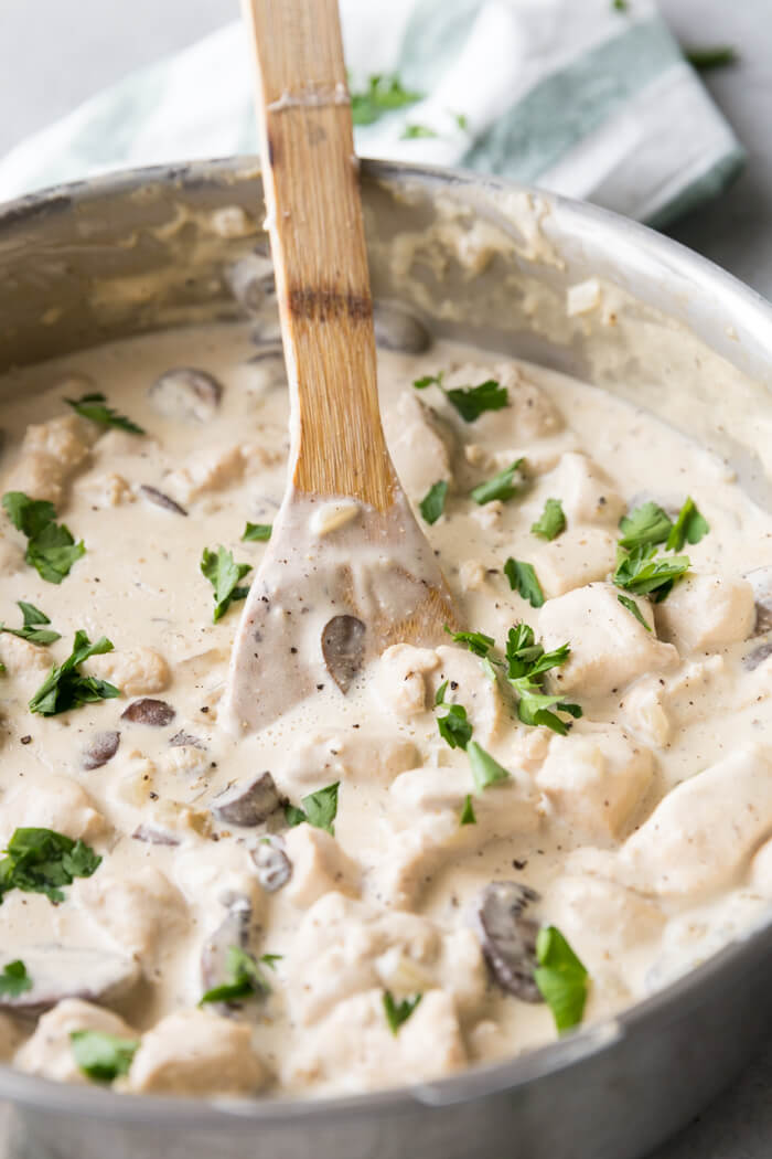 chicken stroganoff sauce and wooden spoon.