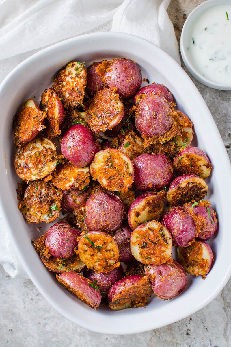 These garlic parmesan roasted potatoes are a delicious side dish or appetizer that you can make in no time. Quick prep time with tons of flavors.