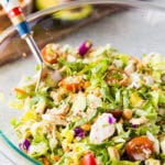 A delicious Greek Chicken Chopped Salad filled with chicken, greek veggies, and a greek vinaigrette.