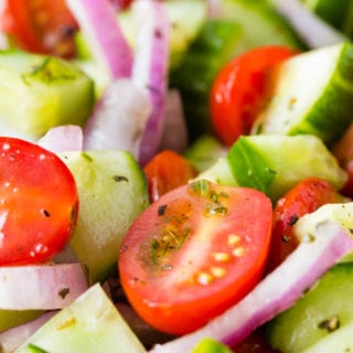 Greek Cucumber Salad is a fresh and tasty dish perfect for summer BBQ's or a midwinter taste of summer