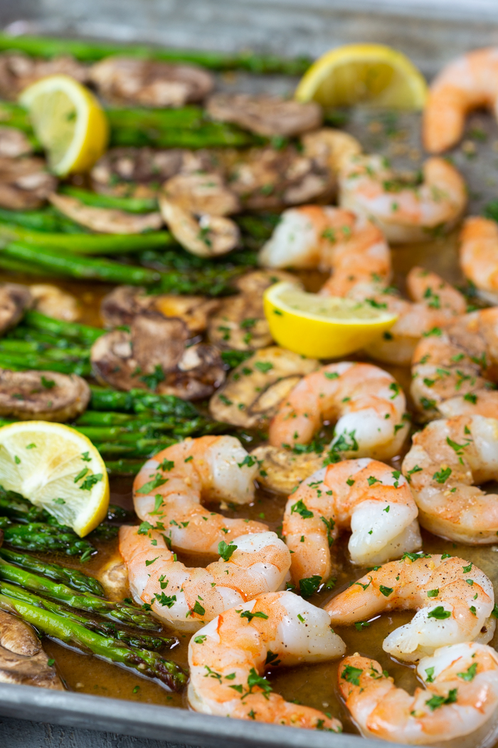 Low calorie sheet pan dinner of honey lemon garlic shrimp and asparagus