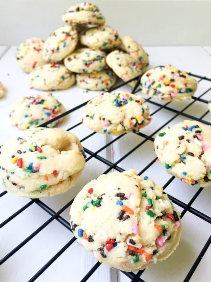 These Funfetti Sugar Cookies are chewy, fluffy and sprinkled with color throughout. With only 9 simple pantry ingredients, you can enjoy these festive cookies in less than 30 minutes!