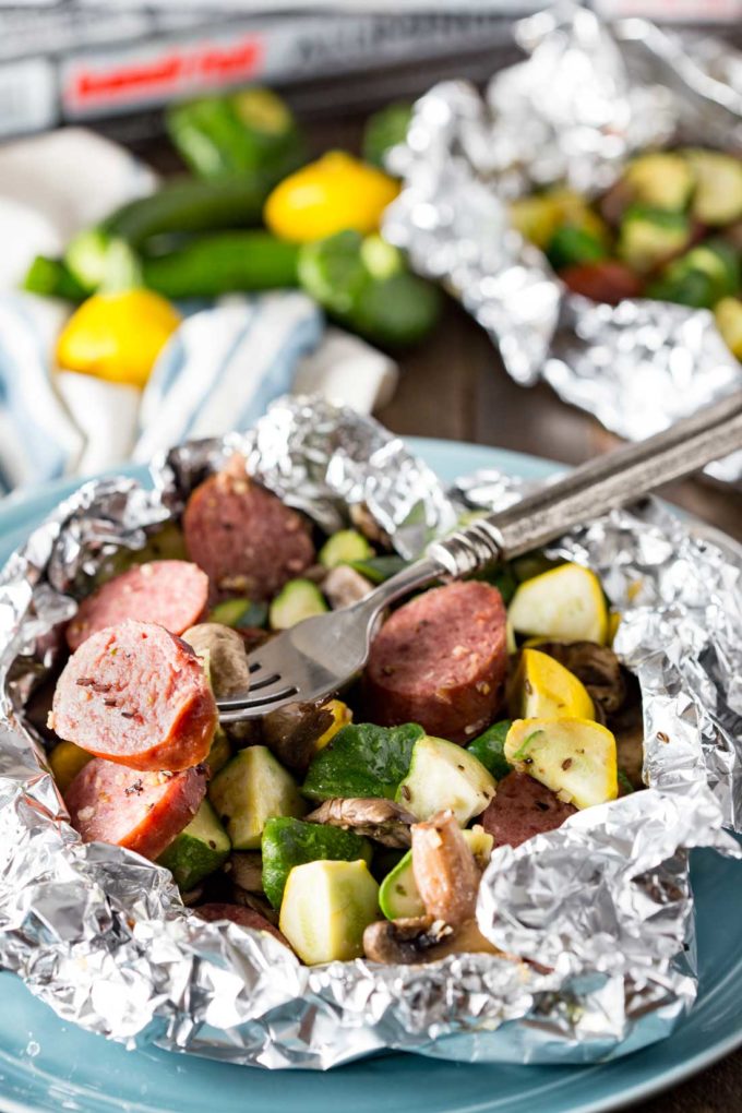 How to Cook Kielbasa in the Oven: Kielbasa sausage and fresh garden yellow squash and zucchini, and mushrooms, lightly seasoned, and cooked in Handi-Foil for the perfect, simple meal.