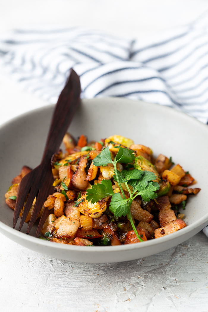 breakfast hash vertical shot in bowl with towel