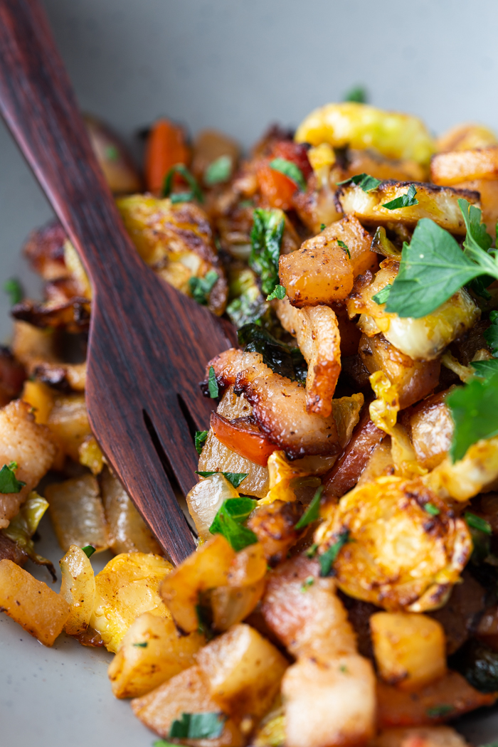 Keto breakfast hash close up with wood fork inserted