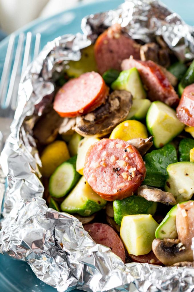 Meals with Kielbasa: Kielbasa sausage and fresh garden yellow squash and zucchini, and mushrooms, lightly seasoned, and cooked in Handi-Foil for the perfect, simple meal.
