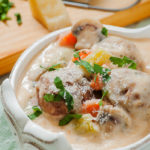 one pot creamy meatball soup, in a white bowl