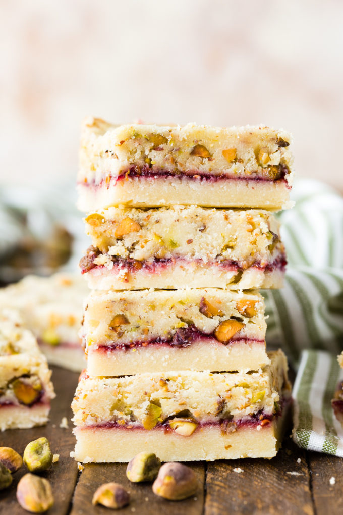 A stack of raspberry pistachio shortbread bars