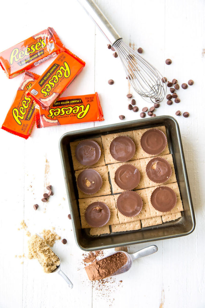 Reese's Ice Box Cake, layers of sweets covered in hot fudge sauce and peanut butter goodness