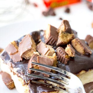 Reese's Ice Box Cake, layers of sweets covered in hot fudge sauce and peanut butter goodness